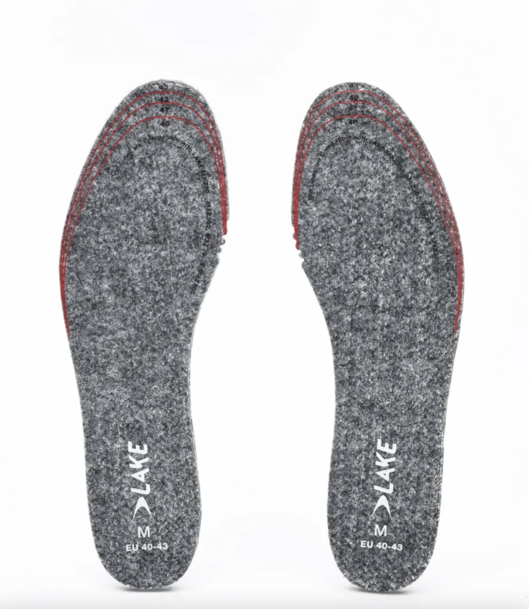 a pair of Lake brand cycling insoles showing the felt4ed wool footbed and the guides to trim for a perfect fit